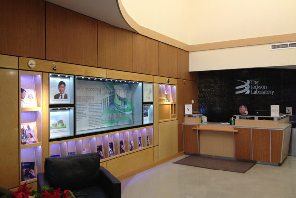 The display case and security desk in The Jackson Lab public entrance.