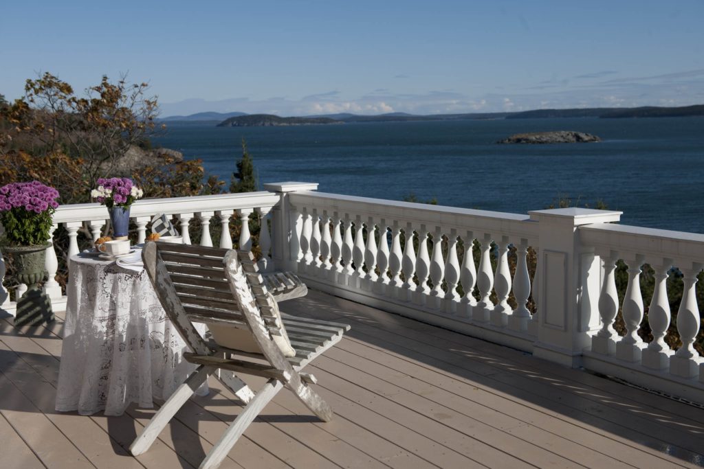 The code compliant glass railing system for the sea-facing back deck.