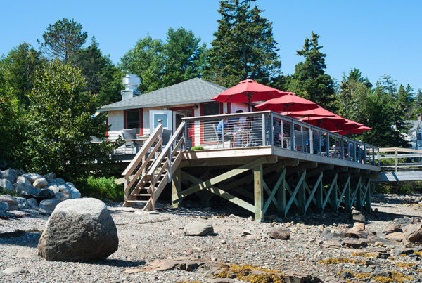 The Boathouse Restaurant exterior viewed from the beach.