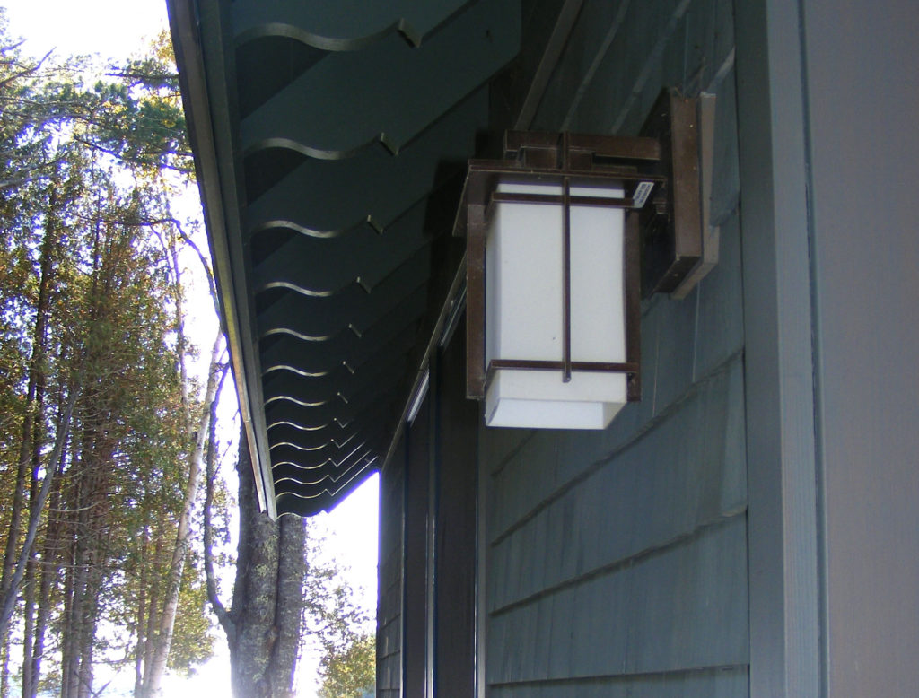 The exposed rafter tails at the eave of Island Cove Cottage in Maine.