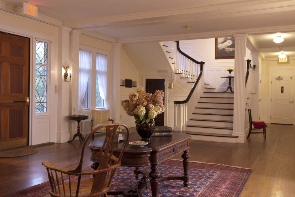 A set of stairs in the High Seas Dormitory and Conference Center leading up to the residential floors.